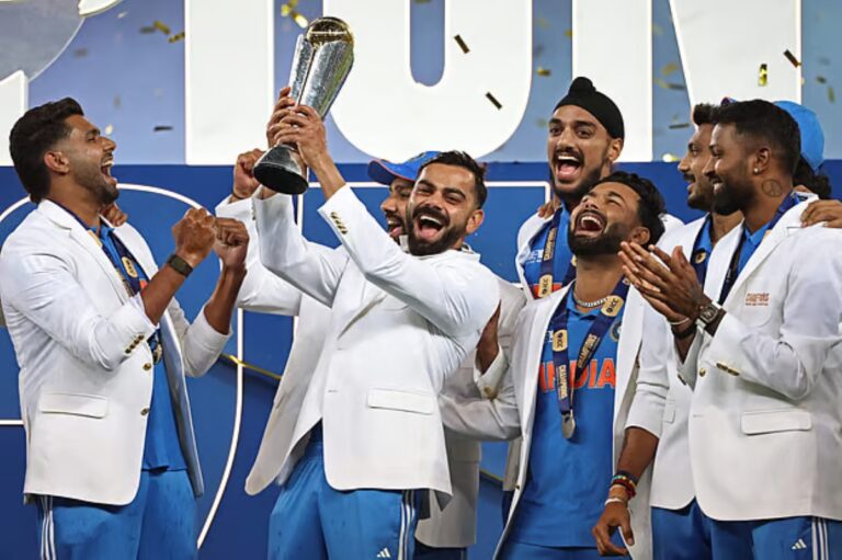 সাদা জ্যাকেট পরে ট্রফি নিয়ে কোহলিদের উচ্ছ্বাস